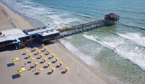 On the beach, sun-loungers, beach towels