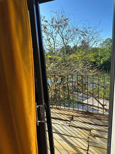 Lovely River view  two bedrooms on The banks of Black River. Breakfast Included!