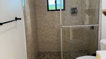 Shower, hair dryer, towels, soap