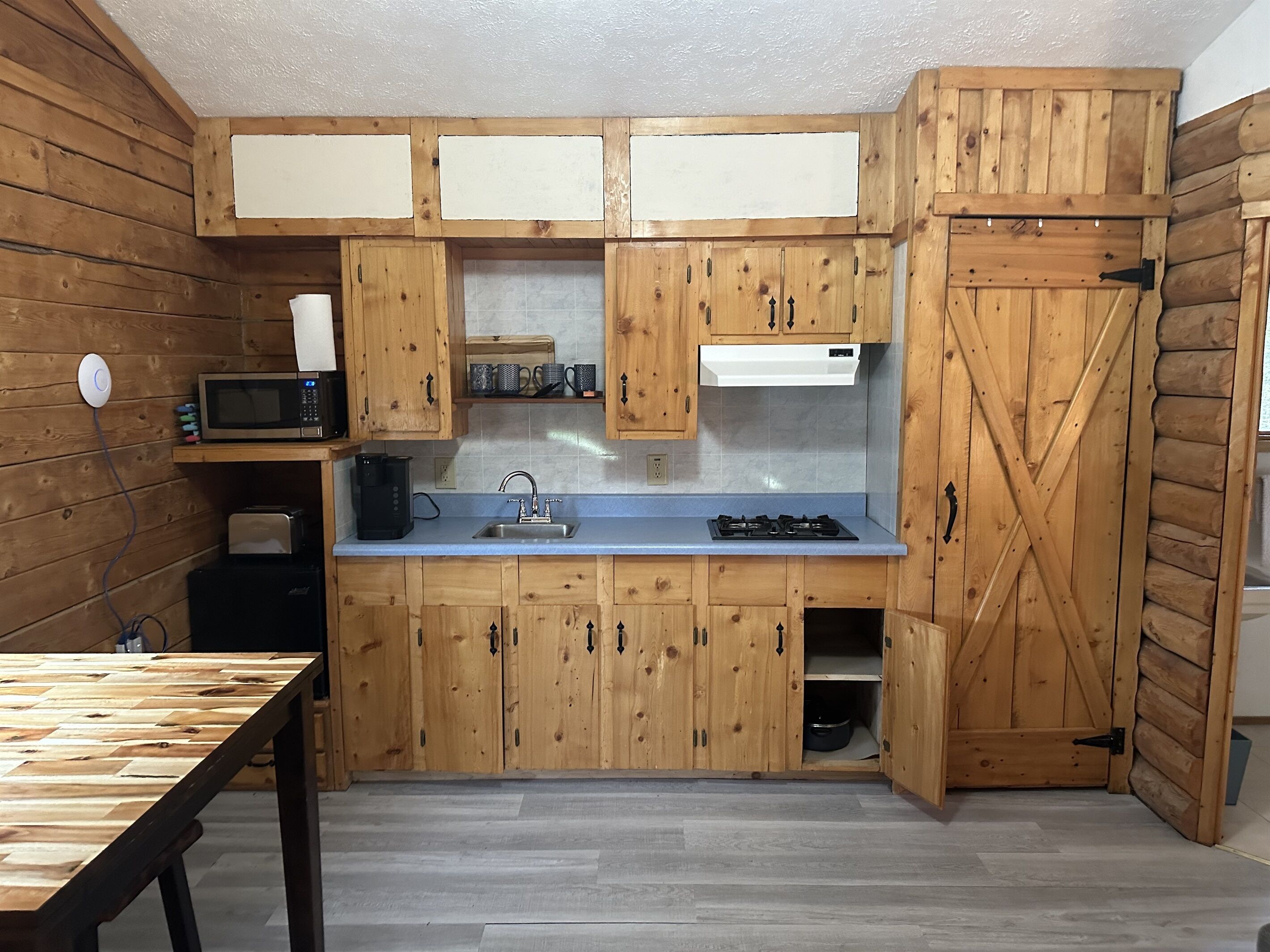 Microwave, stovetop, coffee/tea maker, toaster