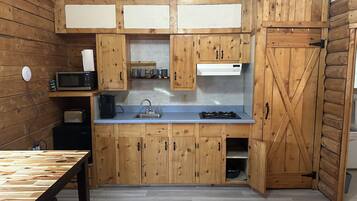 Microwave, stovetop, coffee/tea maker, toaster