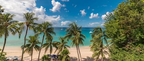 On the beach, sun-loungers