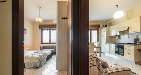 1 habitación, tabla de planchar con plancha, wifi gratis y ropa de cama 