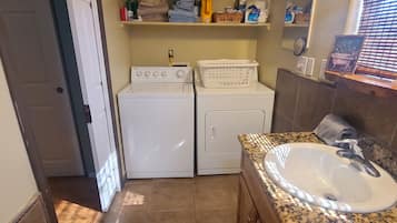 Hair dryer, towels, soap, shampoo