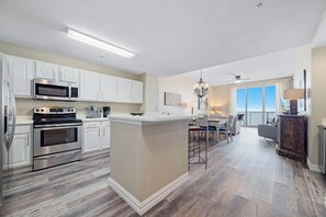 Fridge, microwave, oven, stovetop - Beachfront Condo | Steps from Flora Bama | Pools, Hot Tub, Gym & More! | My Beach Getaways (Pensacola)