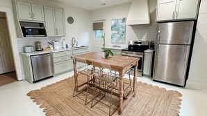 Coffee/tea maker, fridge, microwave, stovetop - The Portico - 2 BR 1 BA Apt (Griffin)