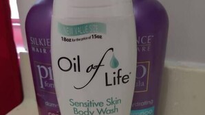 A bottle of Oil of Life Sensitive Skin Body Wash. - Peabody 3 Adorable Apartment (Memphis)