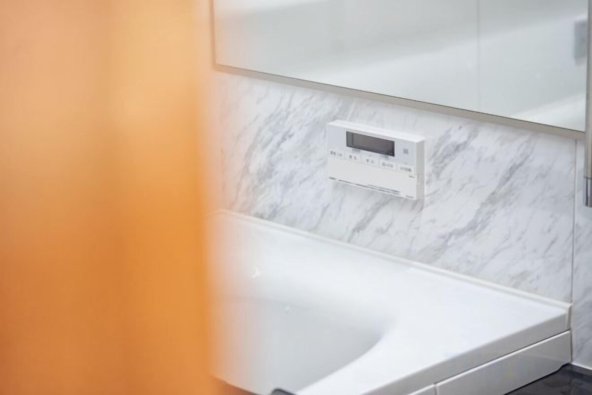 Bathroom | Separate tub and shower, rainfall showerhead, designer toiletries