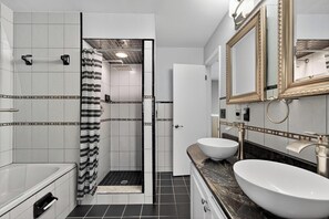 Shower, jetted bath, hair dryer, towels