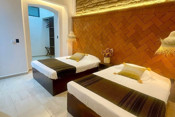 1 bedroom, down comforters, memory foam beds, blackout drapes