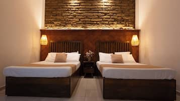 Down comforters, memory foam beds, blackout drapes, iron/ironing board