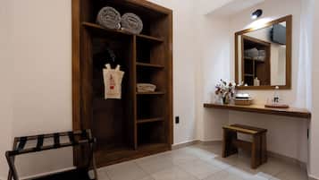 Down comforters, memory foam beds, blackout drapes, iron/ironing board