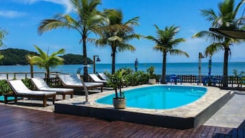 Outdoor pool, open 10:00 AM to 8:00 PM, pool umbrellas, pool loungers