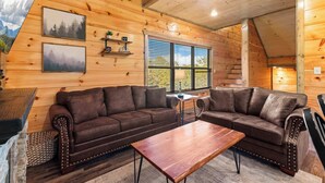 Cabin, Multiple Beds, Pool Access, Mountain View (Hibernation Haven) | Living area | 50-inch flat-screen TV with digital channels, fireplace - Modern Cabin w/ Pool, Hot Tub, Games & More! (Sevierville)