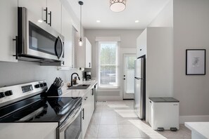 House, Multiple Beds, Patio, Garden View (Deep in the Heart - Main House) | Private kitchen | Coffee/tea maker - Modern Decor Walkable to Soco (Austin)