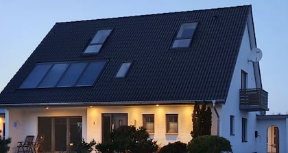 Casa de vacaciones 'Ferienhaus Meerblick' con vistas al mar, terraza privada y Wi-Fi