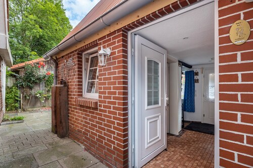 Ferienhaus 'Deichkate Deichwinkel' mit gemeinsamer Terrasse, gemeinsamem Garten und WLAN