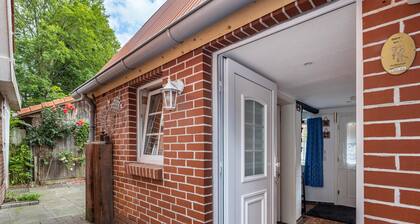 Ferienhaus 'Deichkate Deichwinkel' mit gemeinsamer Terrasse, gemeinsamem Garten und WLAN