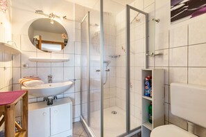 Ducha, secador de pelo, toallas