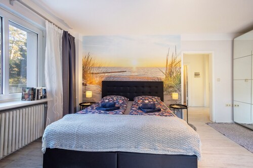 Holiday Home 'Sandstrand' with Private Terrace, Garden, and Wi-Fi