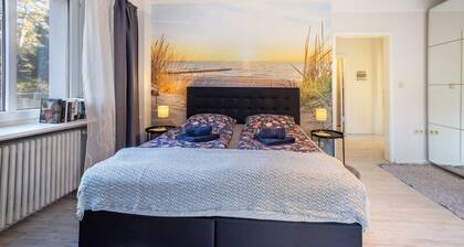 Holiday Home 'Sandstrand' with Private Terrace, Garden, and Wi-Fi
