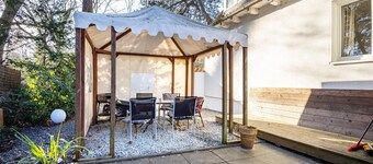 Holiday Home 'Sandstrand' with Private Terrace, Garden, and Wi-Fi