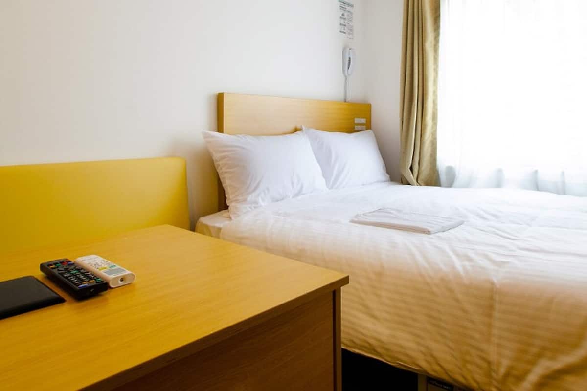 Desk, free WiFi, bed sheets