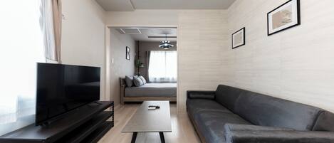 Basic Apartment | Living area | Flat-screen TV