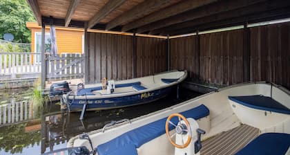 Big Chalet in Friesland by the water with sloop