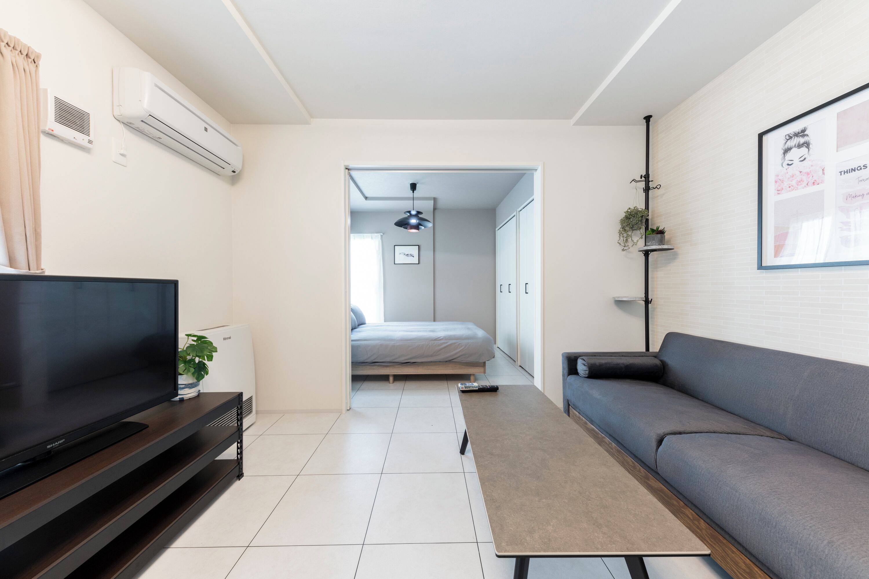 Basic Apartment | Living area | Flat-screen TV