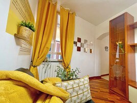 Family Apartment | Living area | Flat-screen TV, toys