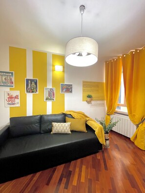 Family Apartment | Living area | Flat-screen TV, toys - Happy Family Apartments Andreana (Genoa)