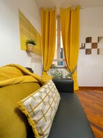 Family Apartment | Living area | Flat-screen TV, toys