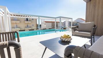 Deluxe Apartment, Balcony, Pool View | Terrace/patio