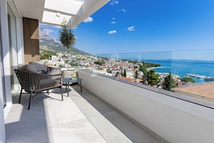 Apartamento família, sacada, vista para o mar | Sacada