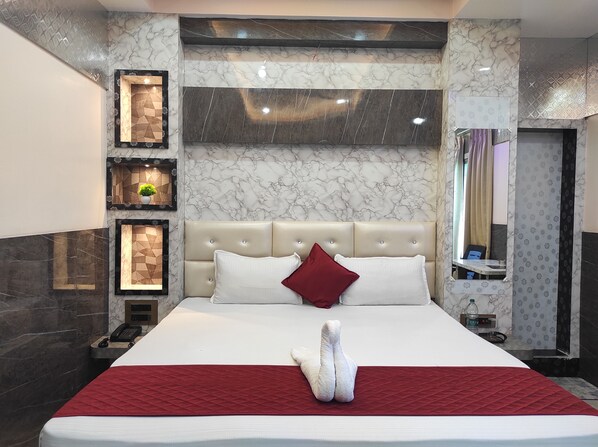 Deluxe Room | Premium bedding, desk, laptop workspace, bed sheets - Hotel Royal Palace (Nagaon)