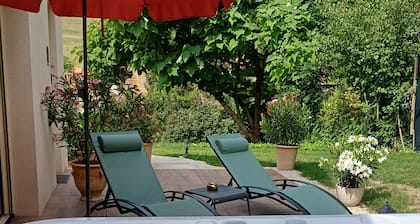 Upscale suite with private spa and indoor pool.