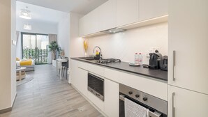 Studio Élite, balcon, vue ville | Cuisine privée
