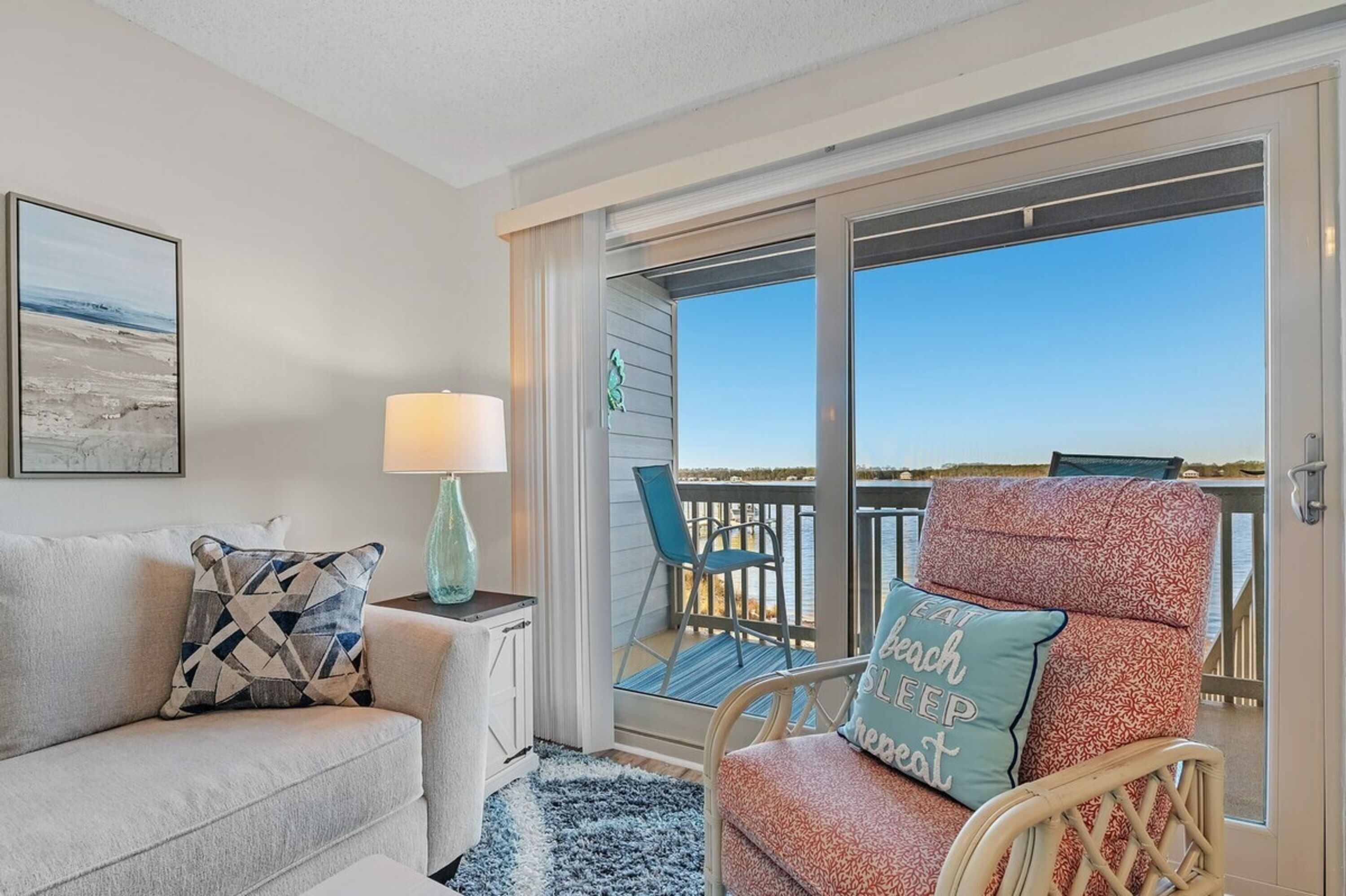 Comfort Condo, 1 Bedroom, Balcony, Beach View | Living room | 52-inch Smart TV with digital channels