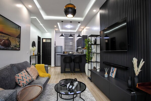 Living area - Gray Haven Lakeside Condo. Cozy 1-bedroom in delightful Entebbe (Entebbe)