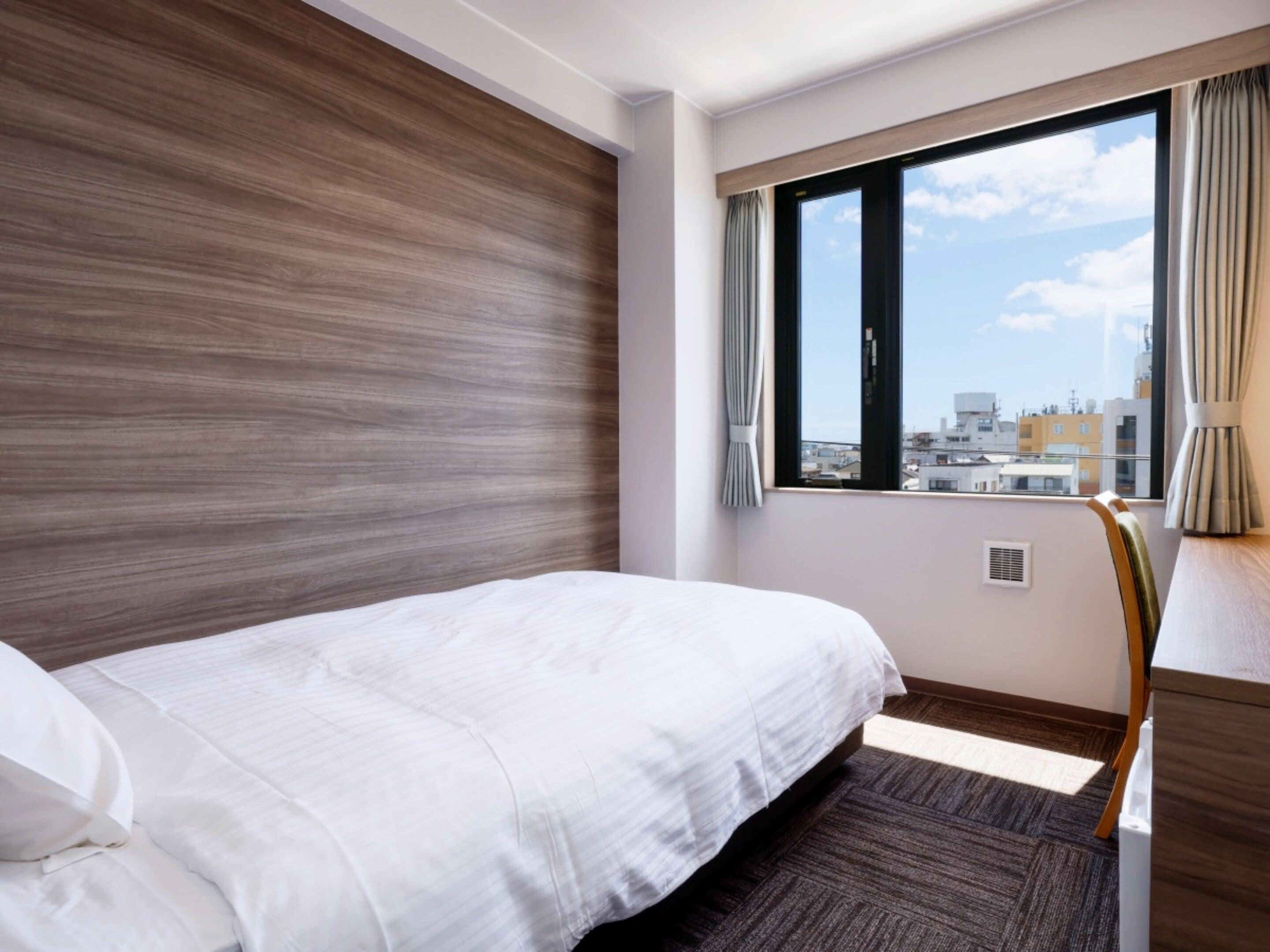 Desk, laptop workspace, free WiFi, bed sheets