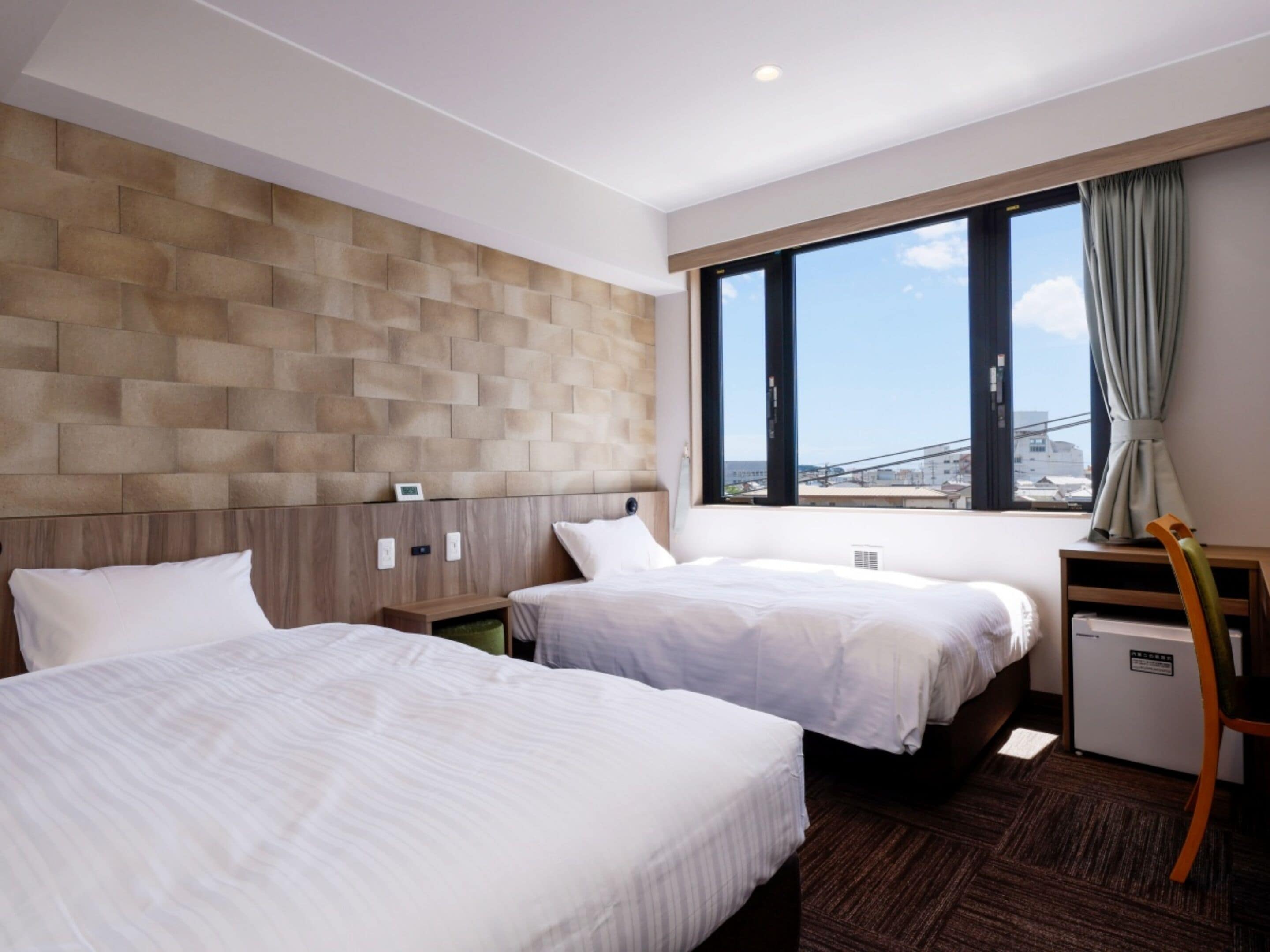 Desk, laptop workspace, free WiFi, bed sheets
