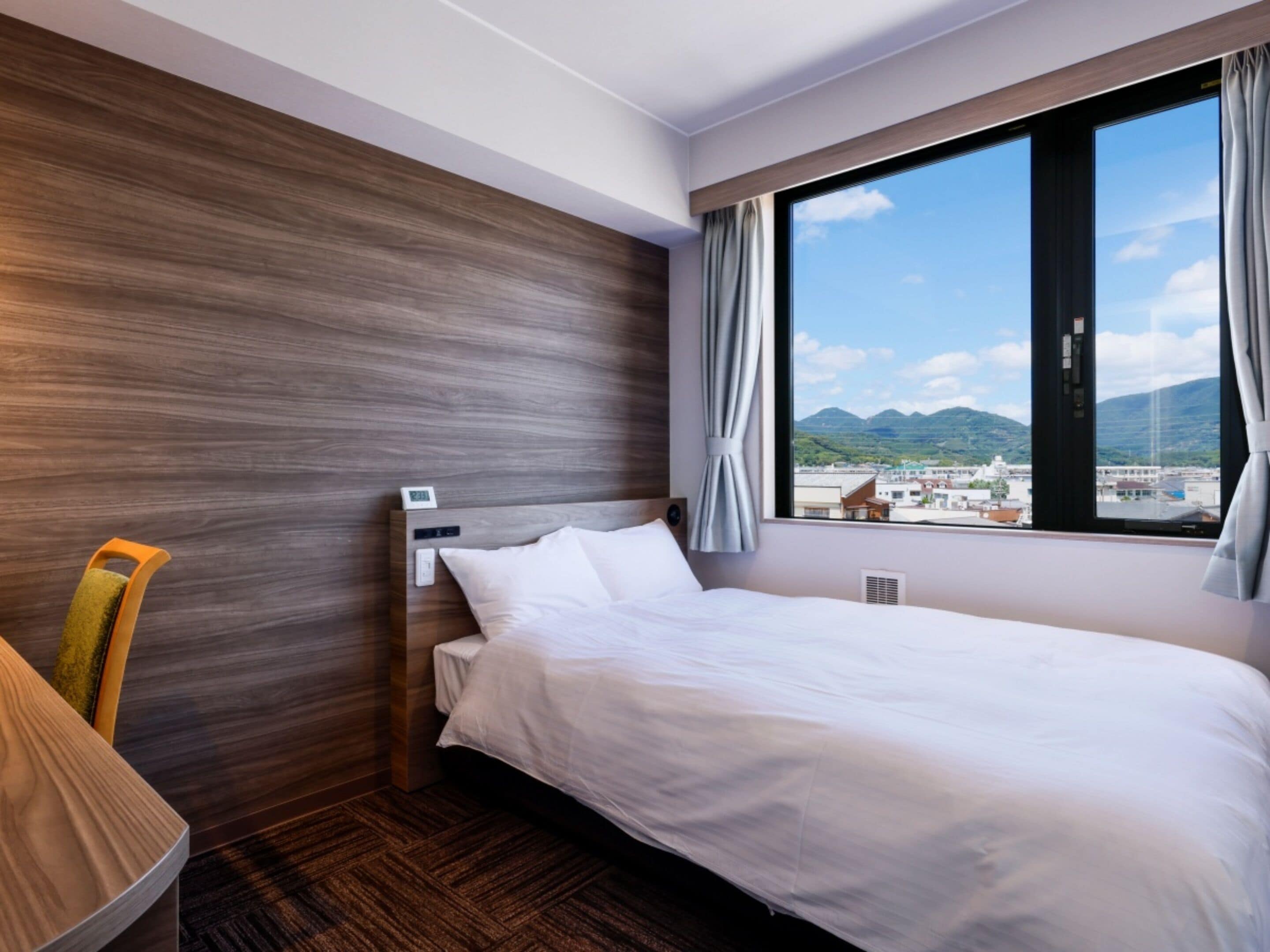 Desk, laptop workspace, free WiFi, bed sheets