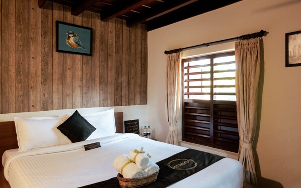 Relax in this inviting space with a comfortable bed and a large window offering a view.