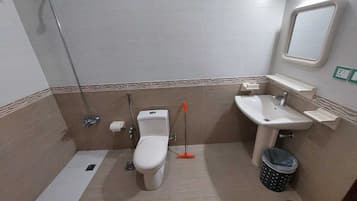 Shower, bathrobes, slippers, towels