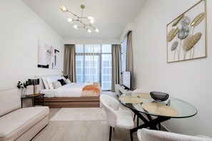 Comfort Apartment, Balcony, Courtyard View | 1 bedroom, blackout curtains, soundproofing, iron/ironing board - New Stylish Studio in Azizi Riviera (Dubai)