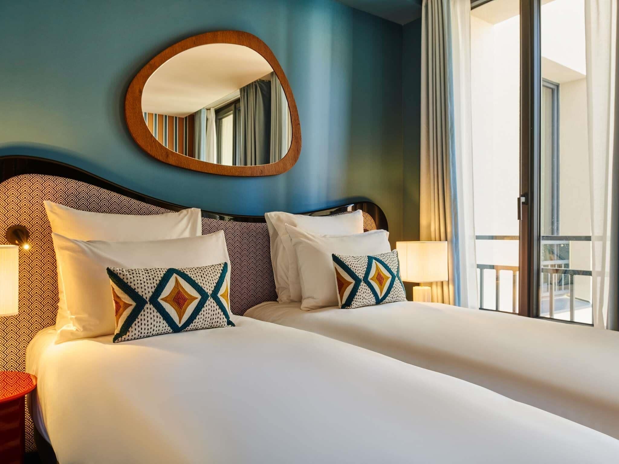 Premium bedding, in-room safe, blackout curtains, soundproofing