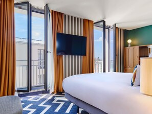 Luxe beddengoed, een kluis op de kamer, verduisterende gordijnen