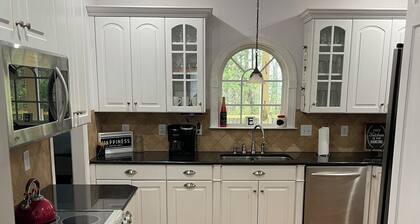 Luxury 5-bedroom house in Cedar Point with AC, WiFi, hotub, private yard & more!