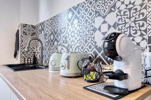 Fridge, microwave, coffee/tea maker, electric kettle